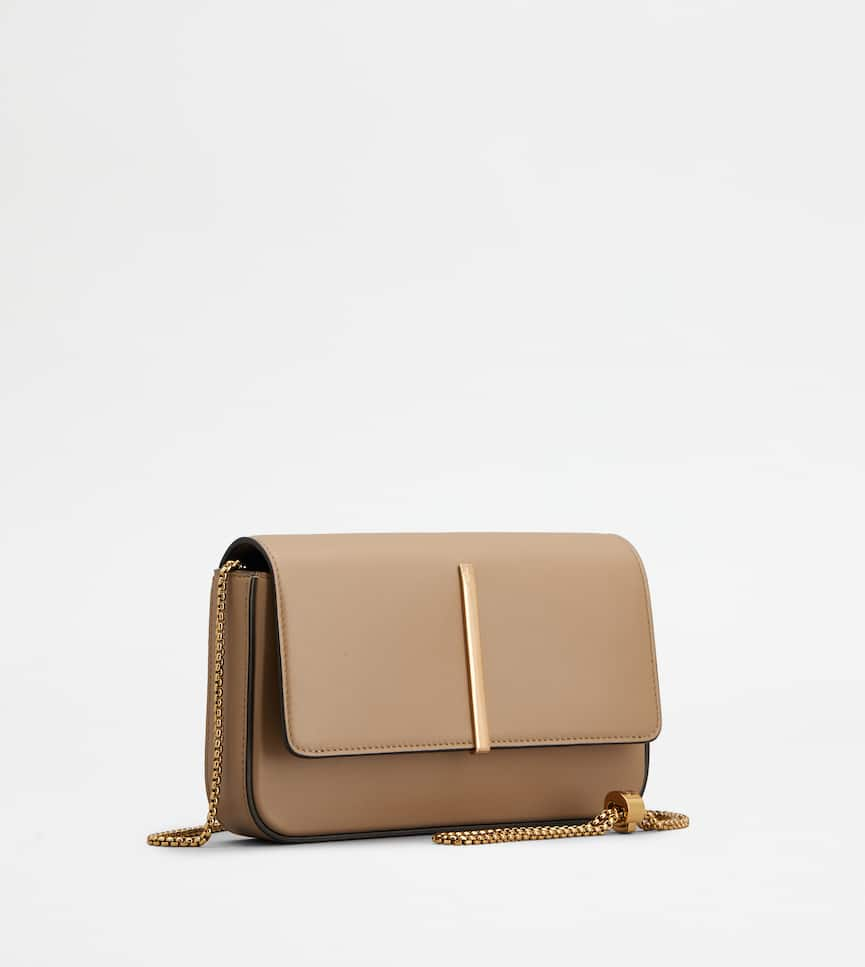 Mini Flap Bag in Leather - Three-quarter view