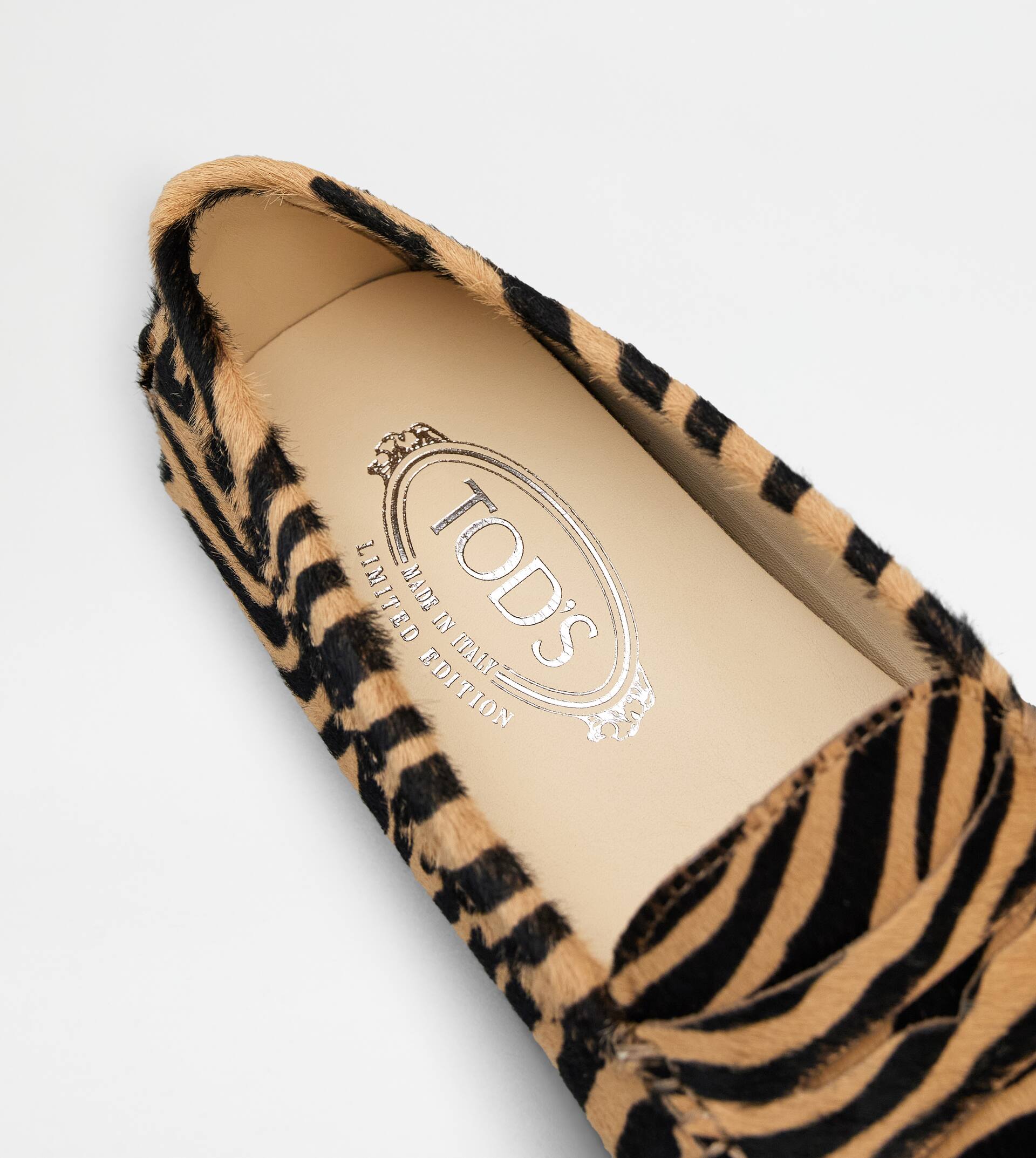 Tod's leopard 2024 print loafers